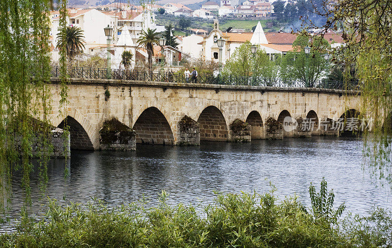 Old arched stone bridge in Mirandela, Bragança district, Portugal.